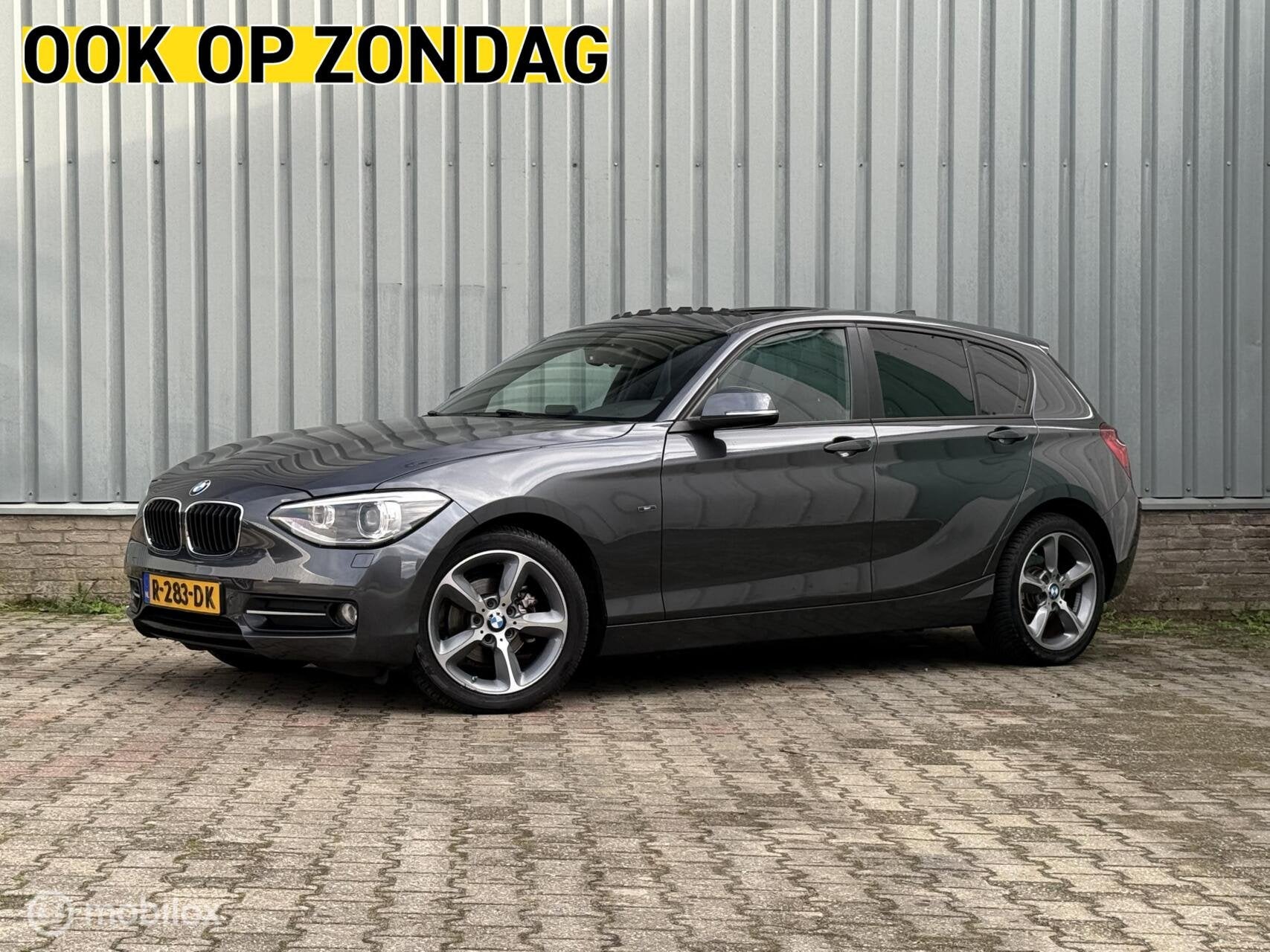 BMW 1-serie 116i Sport High Executive | Schuifdak | Climate, 4 cilinders, 650 kg, Automatische klimaatregeling, 5 stoelen