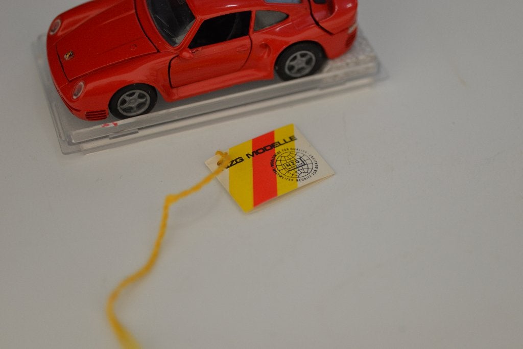 NZG Modelle Porsche 959 rood 1:43, Hobby en Vrije tijd, Modelauto's | 1:43, Overige merken, -, Ophalen of Verzenden, Zo goed als nieuw
