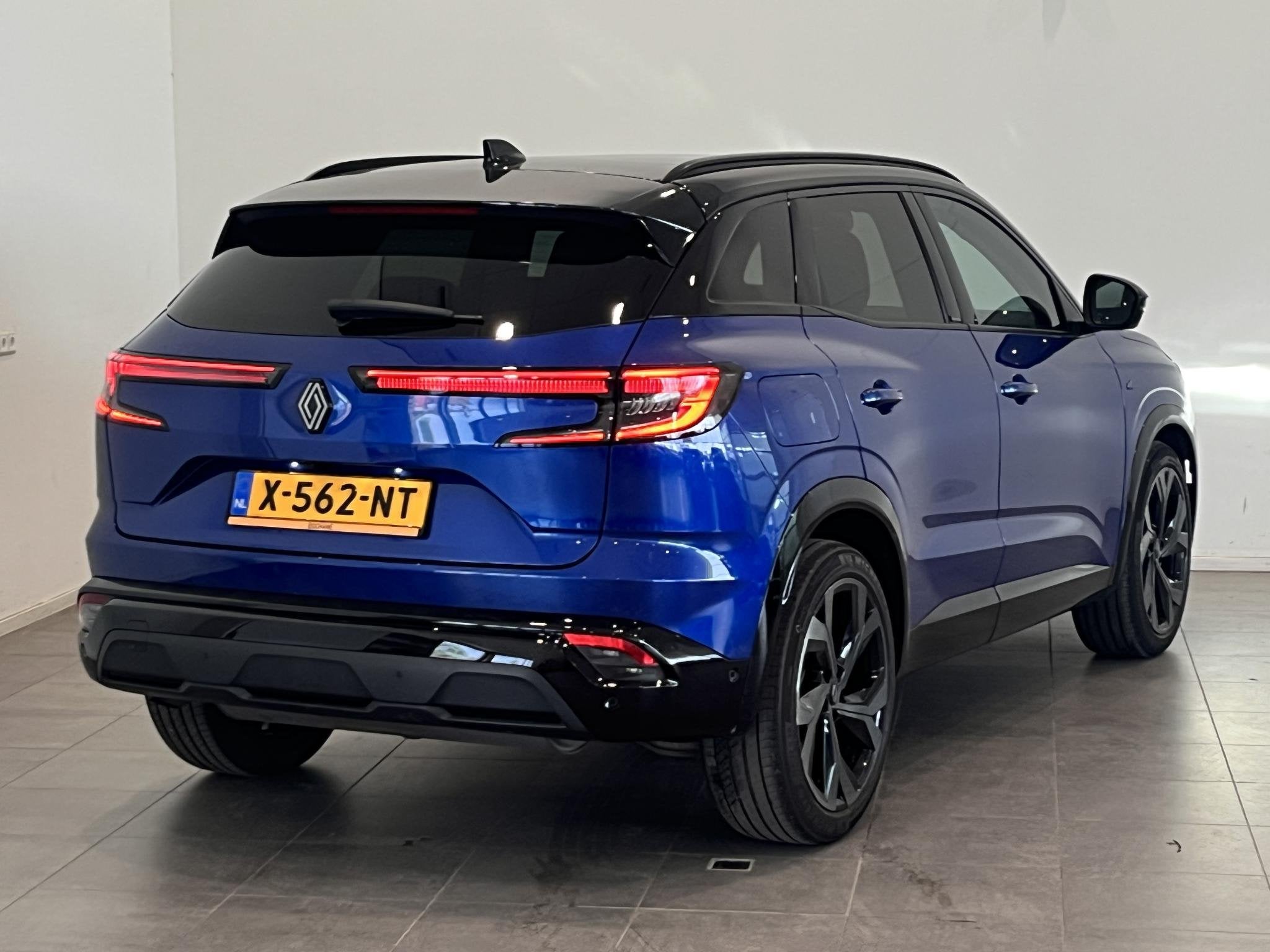 Renault Austral 1.2 E-Tech full hybrid 200 Iconic Esprit Alp, Auto's, Gebruikt, 1199 cc, Blauw, Origineel Nederlands