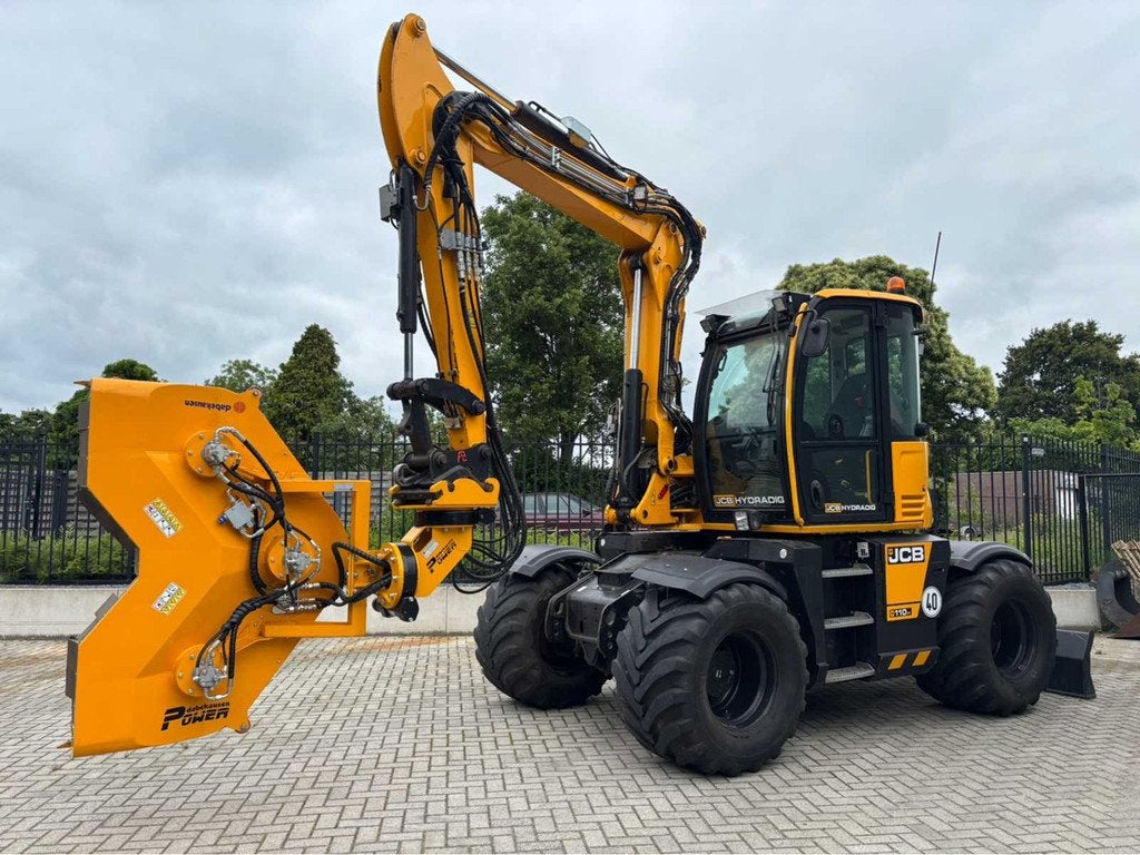 2017 JCB Hydradig 110W Banden graafmachine, Zakelijke goederen, Machines en Bouw | Kranen en Graafmachines, Graafmachine