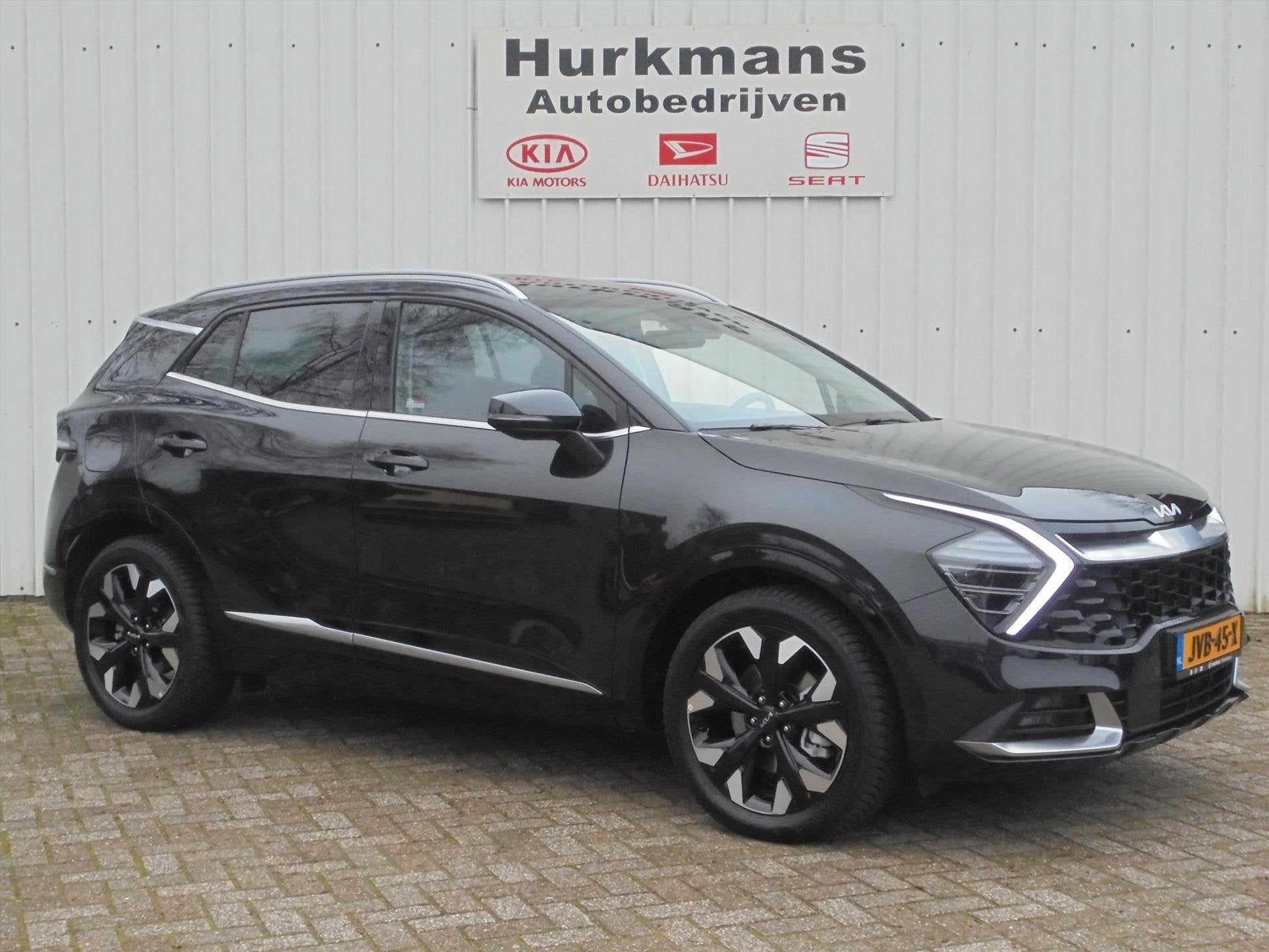 Kia Sportage 1.6 T-GDi 265PK PHEV LEER AWD ZEER COMPLEET, Automaat, Gebruikt, 4 cilinders, Zwart
