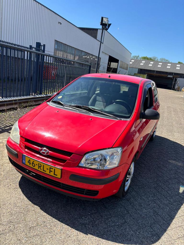 Hyundai Getz 1.1 5DRS 2005 Rood APK 20-03-2027, Auto's, Voorwielaandrijving, 31 €/maand, 4 cilinders, Airbags