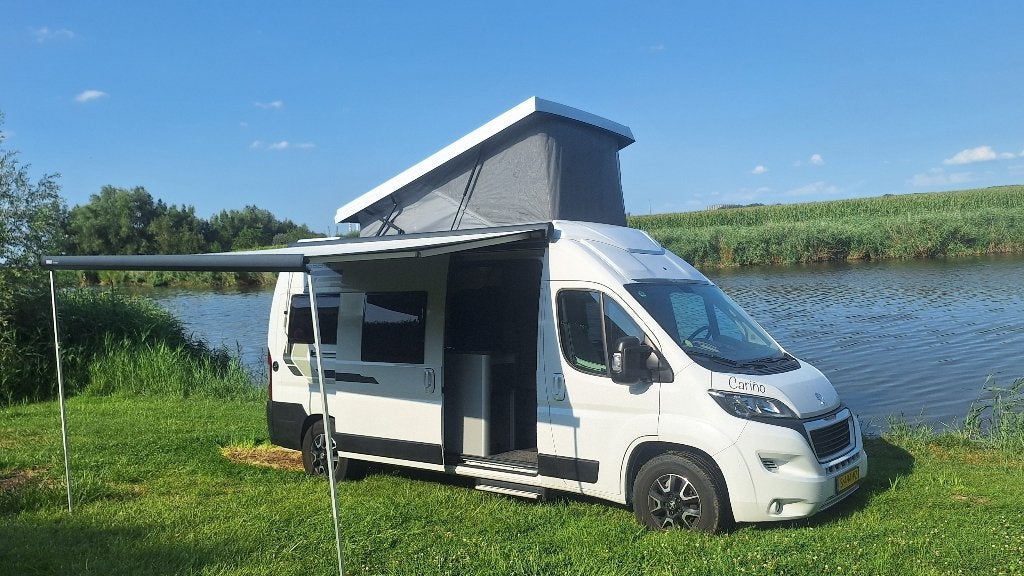 Buscamper Weinsberg Caratour 600 met hefdak / slaapdak, Particulier, 5 tot 6 meter, Overige merken, Luifel