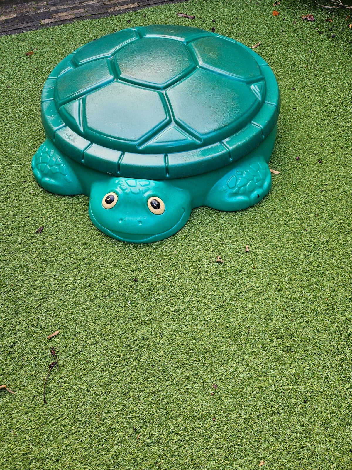 Schildpad zandbak, Ophalen