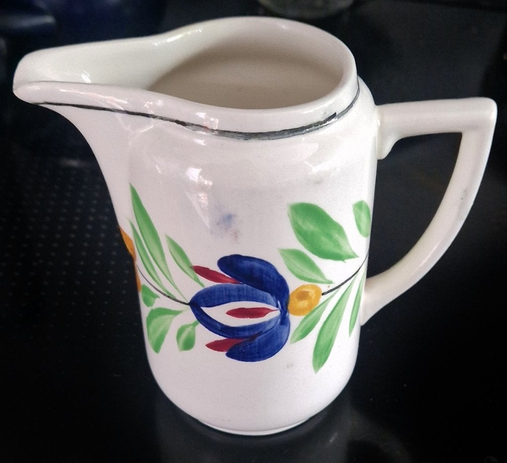 Aparte Schenkkan in afwijkend handbesch. Boerenbont patroon, Antiek en Kunst, Antiek | Servies los, Ophalen of Verzenden