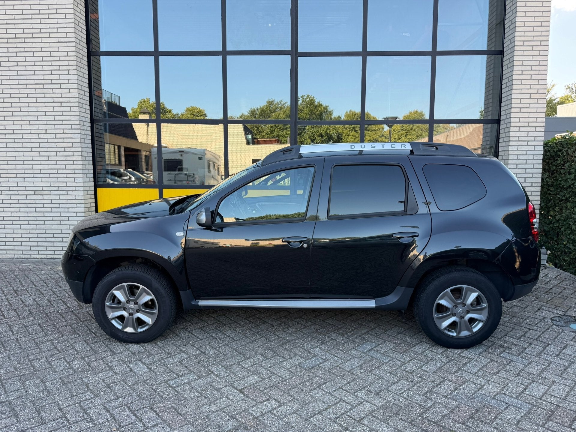 Dacia Duster 1.2 TCe 4x2 Prestige, Leer, Airco, Camera, Auto's, Voorwielaandrijving, 125 pk, Gebruikt, 4 cilinders