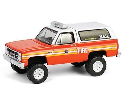 1987 GMC Jimmy Greenlight 1/64 FDNY New York Fire Department, Hobby en Vrije tijd, Modelauto's | Overige schalen, Ophalen of Verzenden