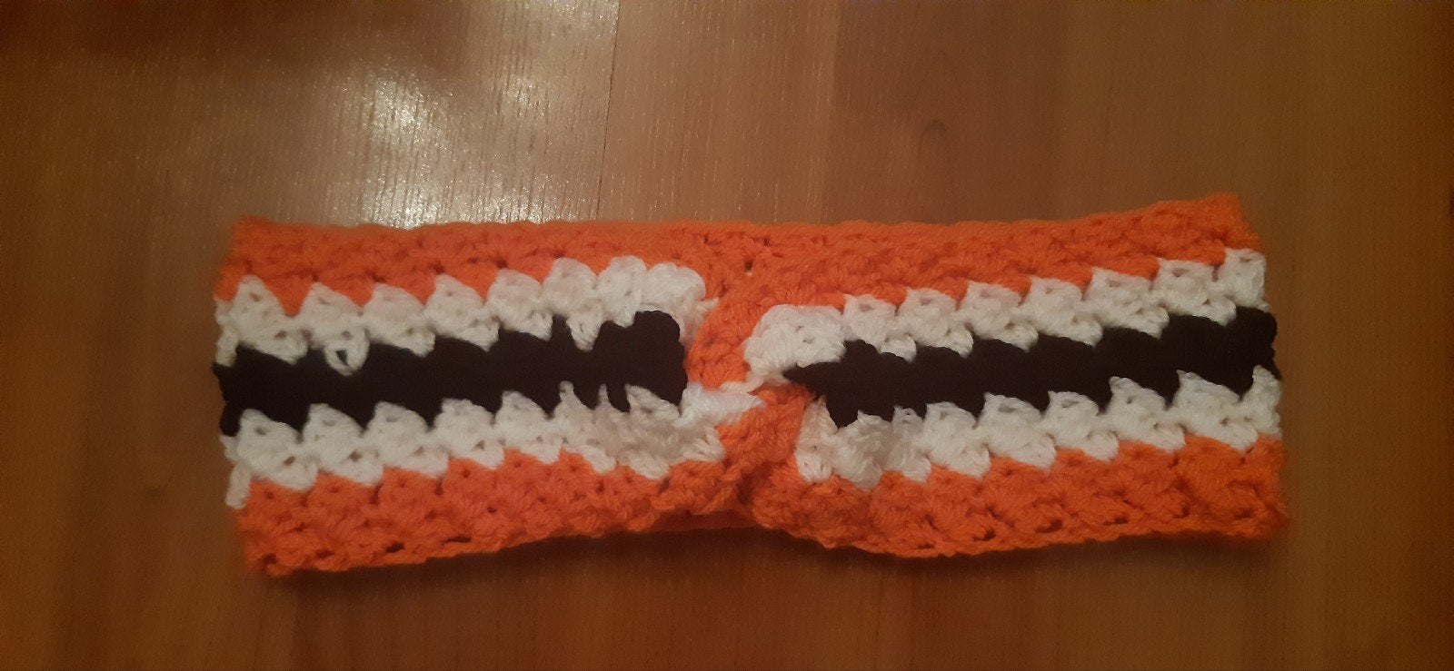 Haarband in de kleuren oranje, wit en zwart, Ophalen of Verzenden, Nieuw, Overige typen