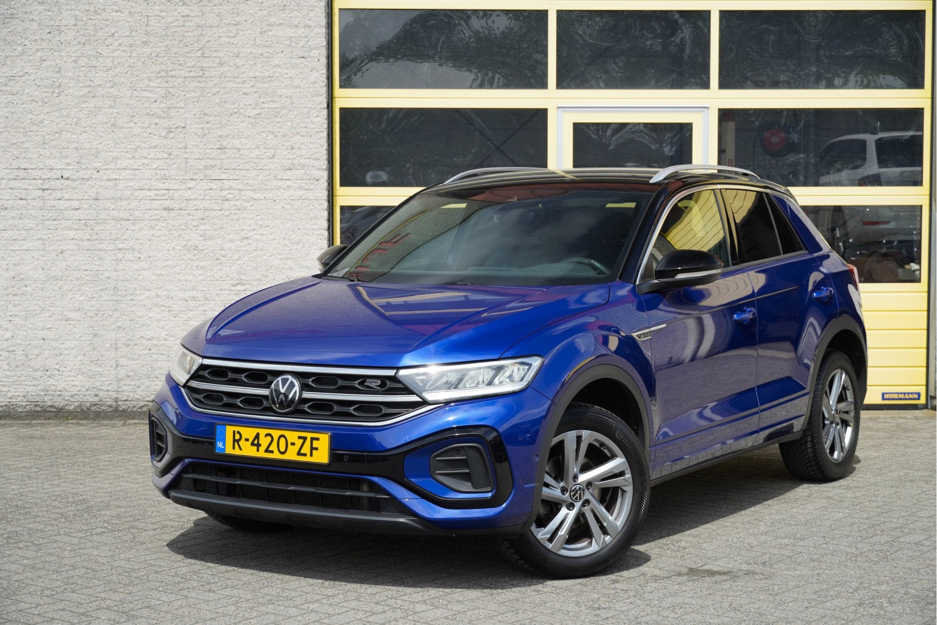 Volkswagen T-Roc 1.5 TSI 150PK! R-Line BJ2023 Lmv 17" | Led, Auto's, Volkswagen, Voorwielaandrijving, 4 cilinders, 150 pk, Blauw