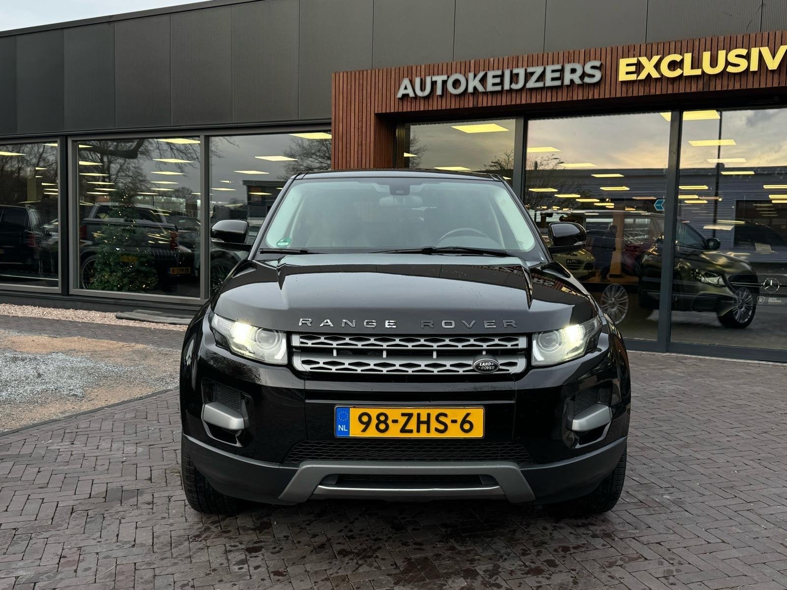Land Rover Range Rover Evoque 2.0 Si 4WD Leer Nette auto, Auto's, Land Rover, Automaat, Euro 5, Zwart, 4 cilinders
