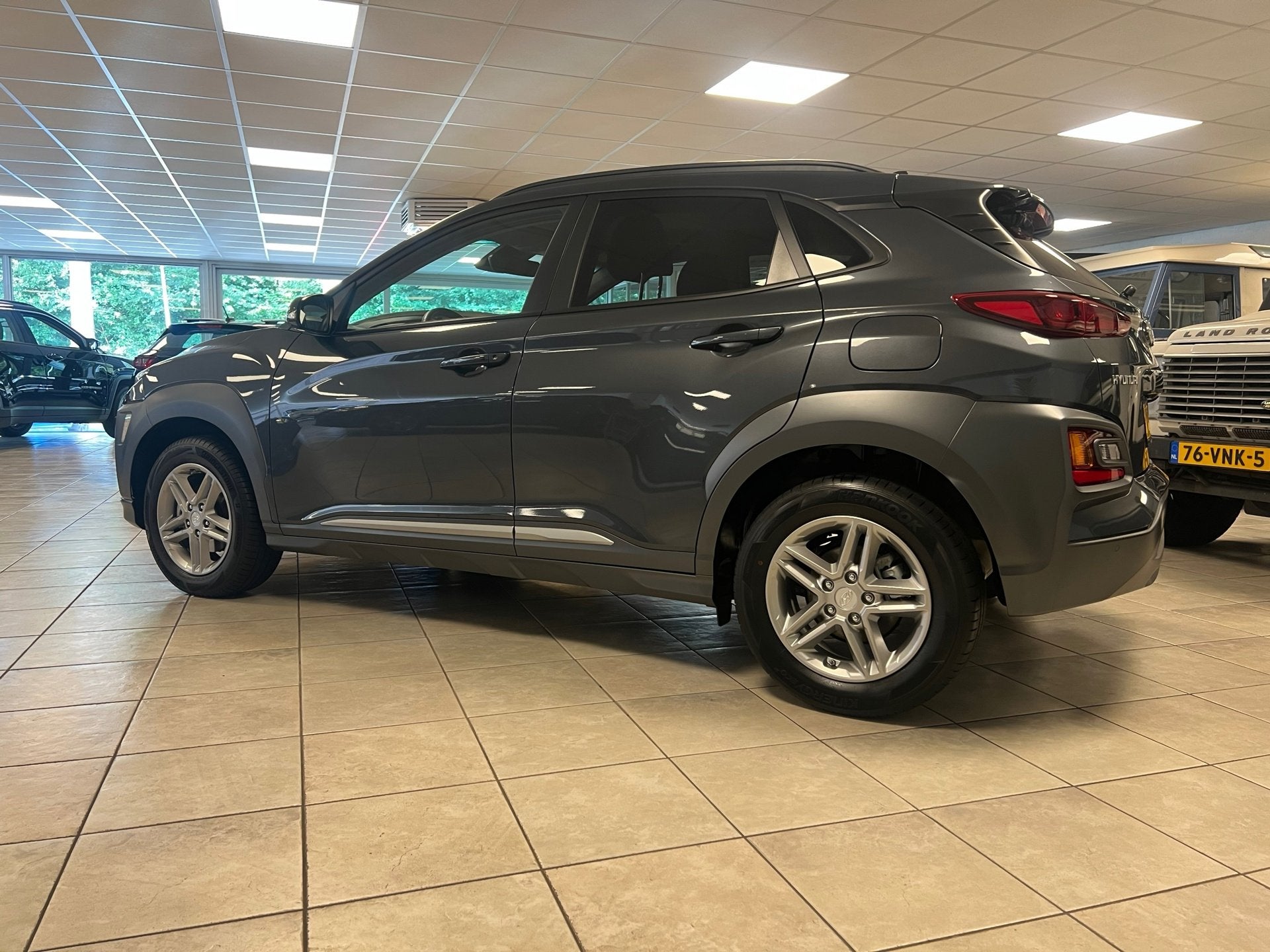 Hyundai Kona 1.0 T-GDI Fashion Naviagtie, Climate controle,, Auto's, Voorwielaandrijving, Dealer onderhouden, Stof, Gebruikt