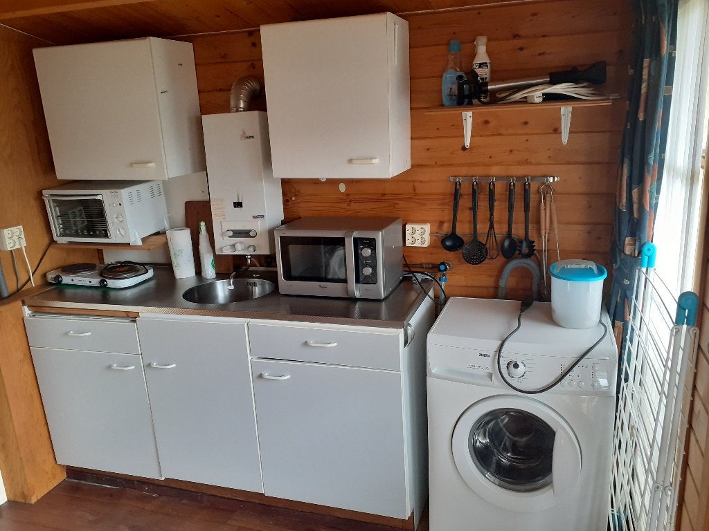 Foto 18 van te koop mooi chalet met tuinhuis naast zwem vis en vaarwater