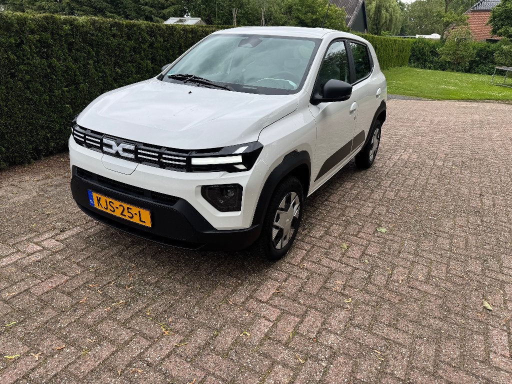 Dacia Spring Electric 65 2025 km7477 met fabrieksgarantie!!, Stof, Zwart, Overige carrosserieën, 4 stoelen