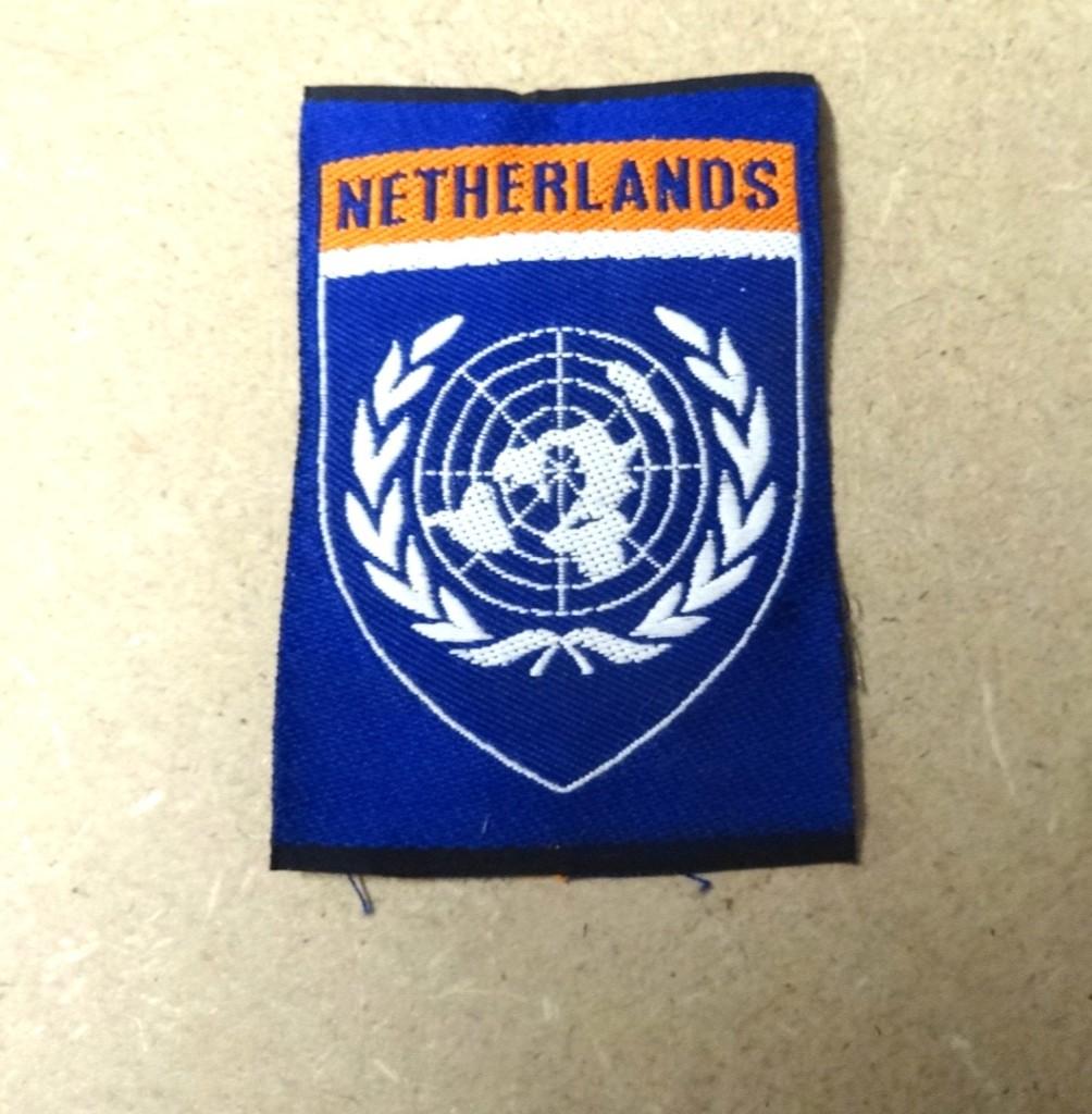 VN . UN.  Embleem, Ophalen of Verzenden, Landmacht, Nederland, Embleem of Badge