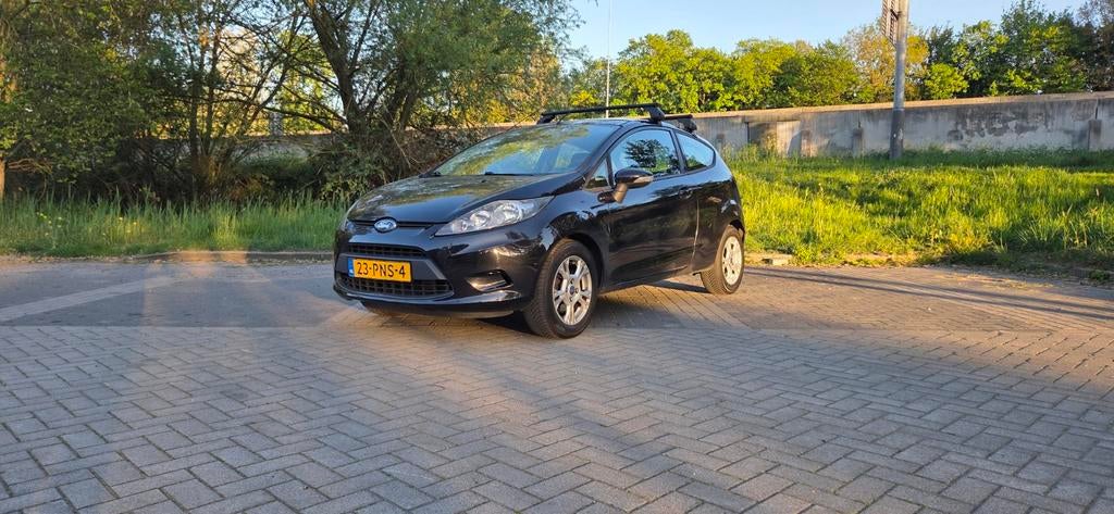 Ford Fiesta 1.25 benzine Airco, Voorwielaandrijving, Euro 5, Stof, Zwart