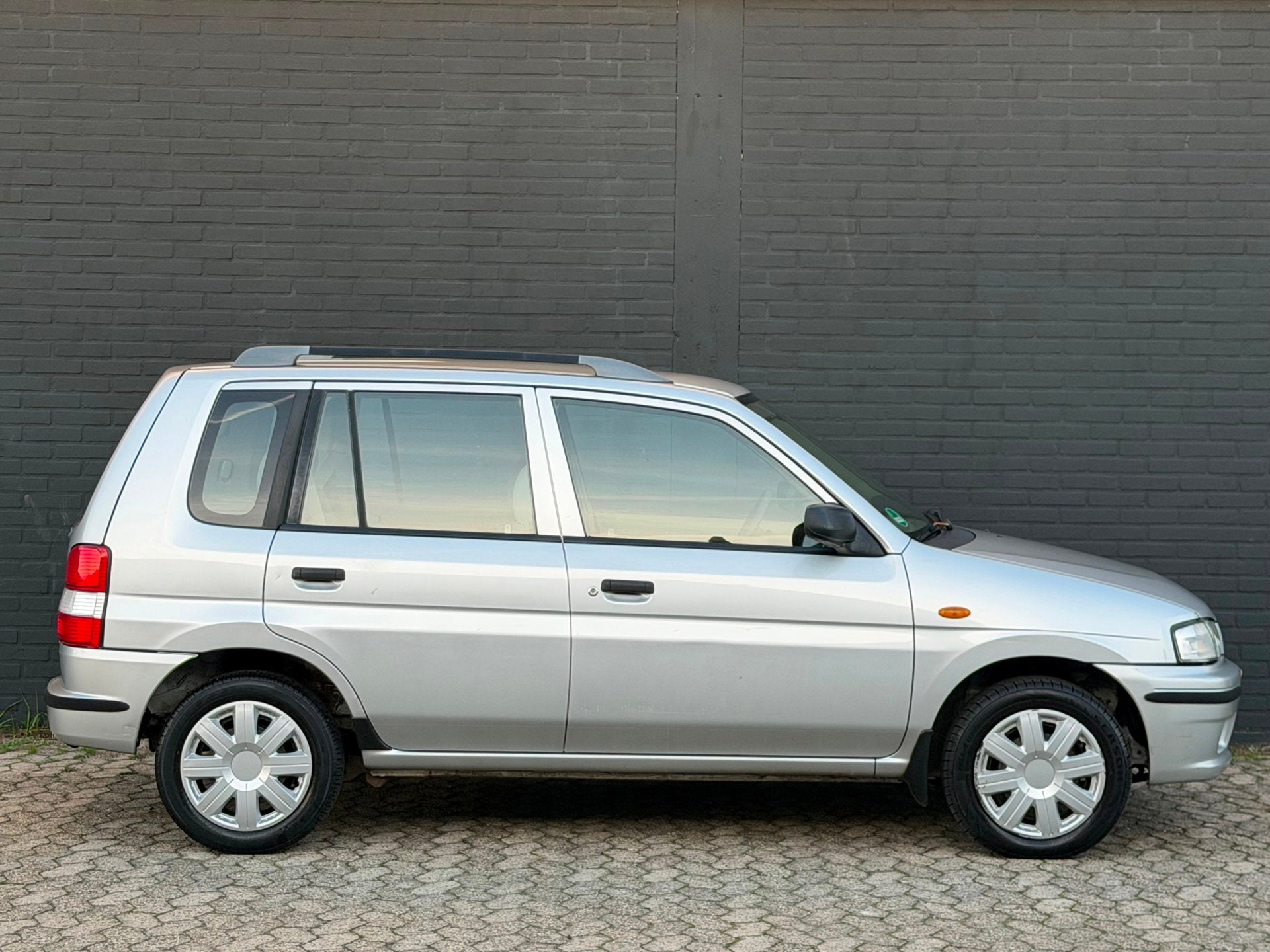 Mazda Demio 1.3 LX APK NAP, 31 €/maand, Bedrijf, Zilver of Grijs, 1324 cc