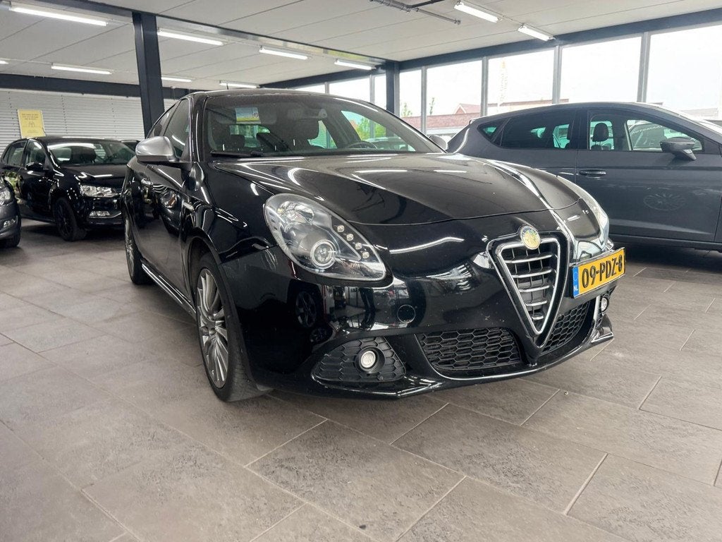 Alfa Romeo Giulietta 1.4 T Distinctive half leer navigatie C, Auto's, Alfa Romeo, Voorwielaandrijving, Euro 5, Gebruikt, Zwart