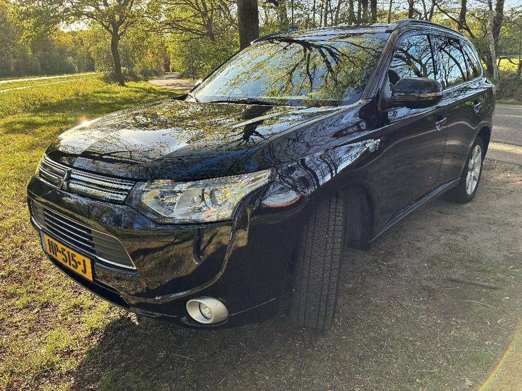 Mitsubishi Outlander 2.0 Dohc Mivec Phev 203pk 4WD CVT 5P, Auto's, Automaat, 1998 cc, Outlander, Zwart