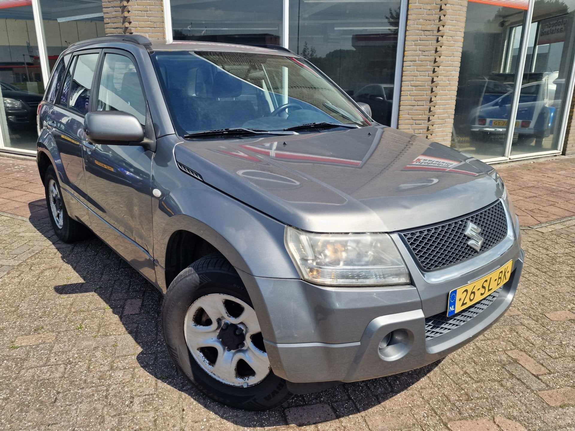 Suzuki Grand Vitara 2.0-16V JLX - Airco - 4x4 -, Auto's, Suzuki, Zwart, 4 cilinders, 1850 kg, Grand Vitara