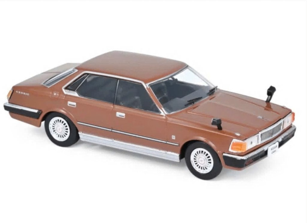 NISSAN CEDRIC 430 1979 BRUIN schaal 1/43 NOREV ref: 420148