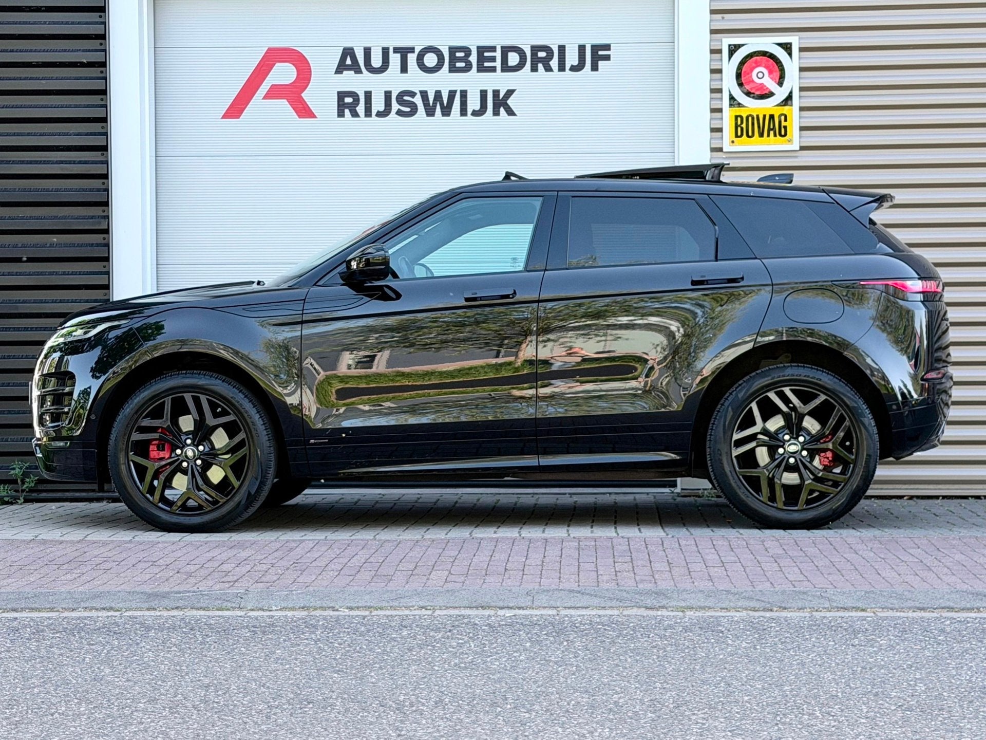 Land Rover Range Rover Evoque 1.5 P300e AWD Autobiography Pa, Auto's, 12 maanden, Euro 6, Zwart, Bedrijf