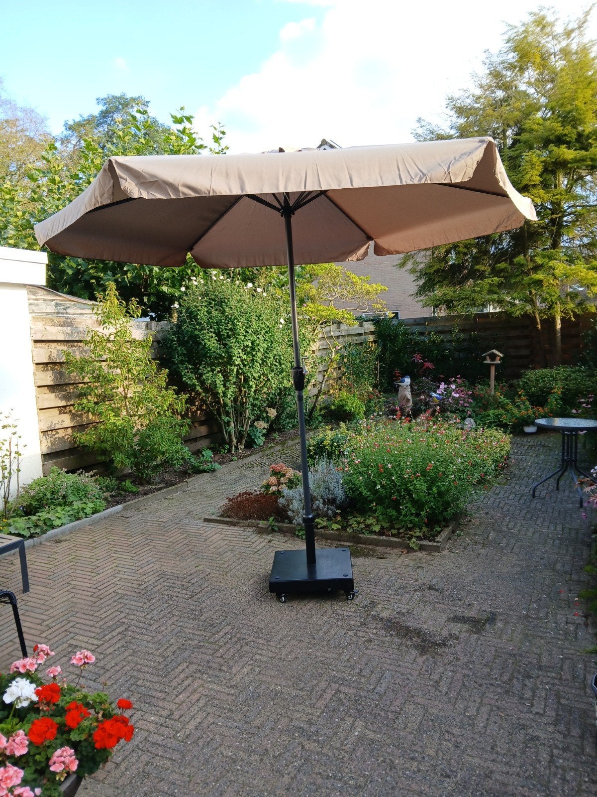 Foto 2 van 2 parasols