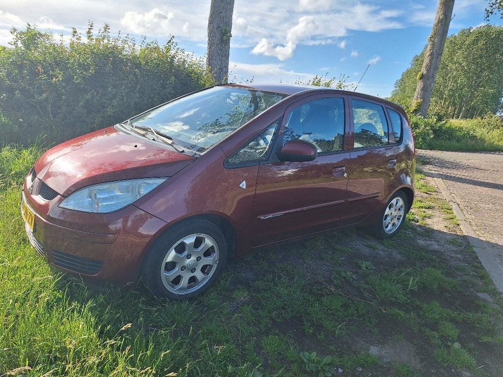 Mitsubishi Colt 1.1 Mivec 2006 Rood, Auto's, Voorwielaandrijving, Stof, 74 pk, Colt