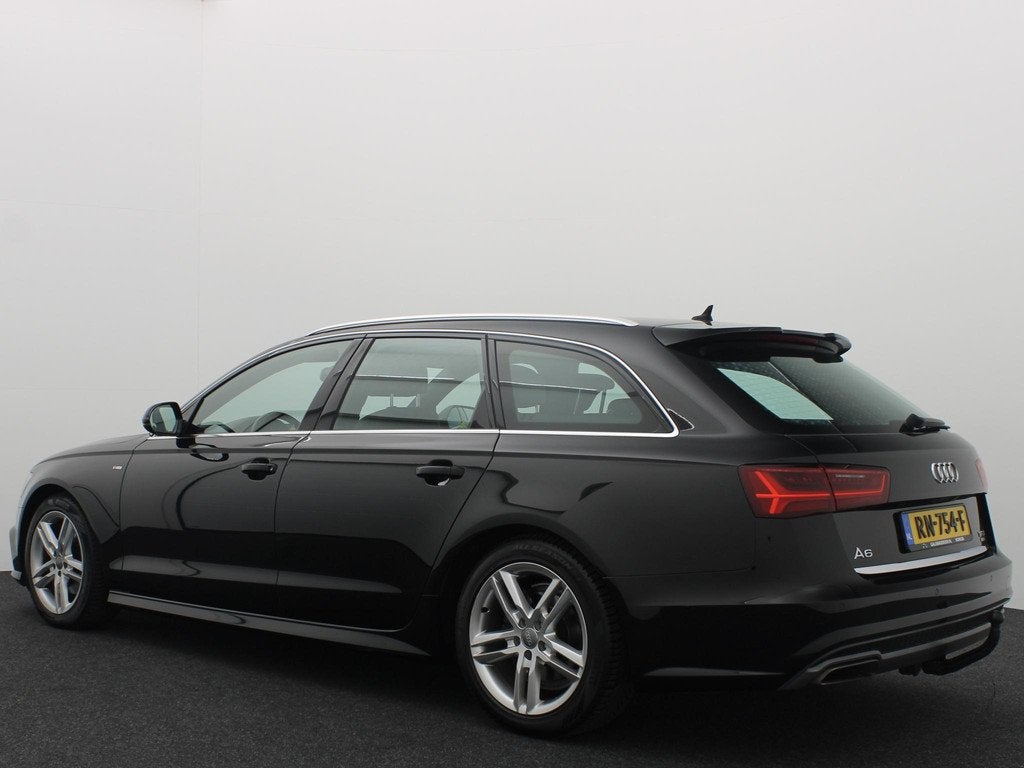 Audi A6 Avant 1.8 TFSI ultra S line Edition AUTOMAAT / TREKH, Auto's, Leder en Stof, Zwart, Origineel Nederlands, 93 €/maand