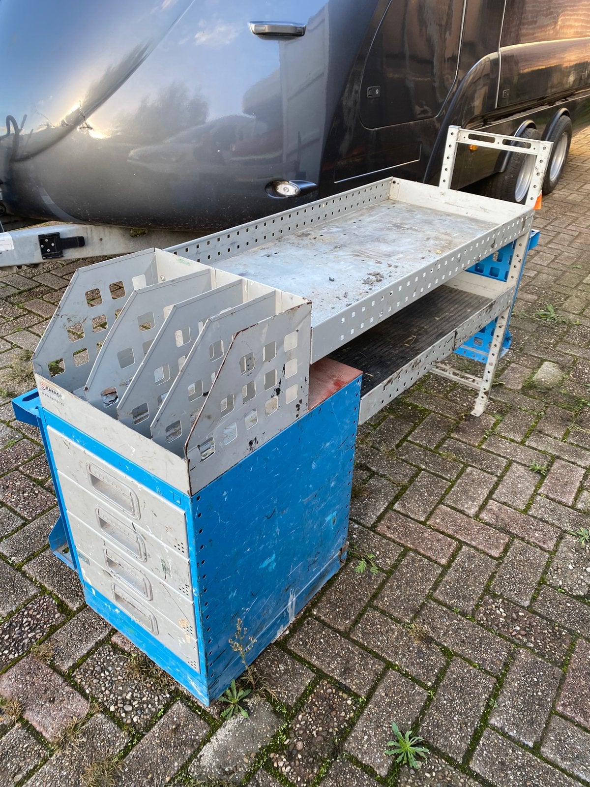 Bedrijfswageninrichting kast, Ophalen