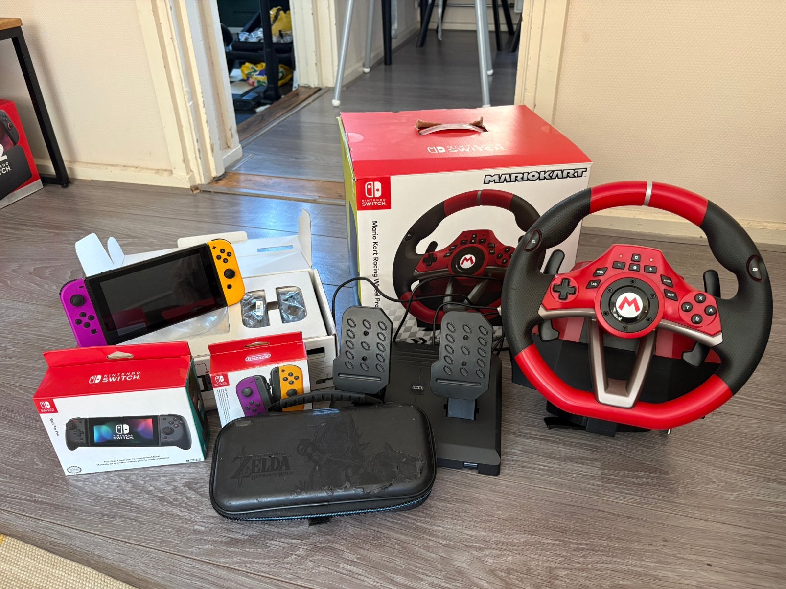 Nintendo Switch v1 met 65W Snellader, Hori Stuur + Grips, Ophalen, Zo goed als nieuw, Switch, Overige controllers