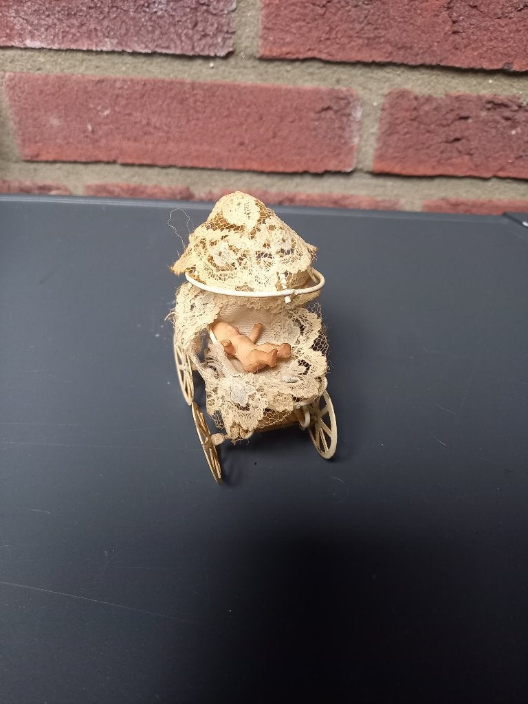 miniatuur oud poppenwagentje, Ophalen of Verzenden