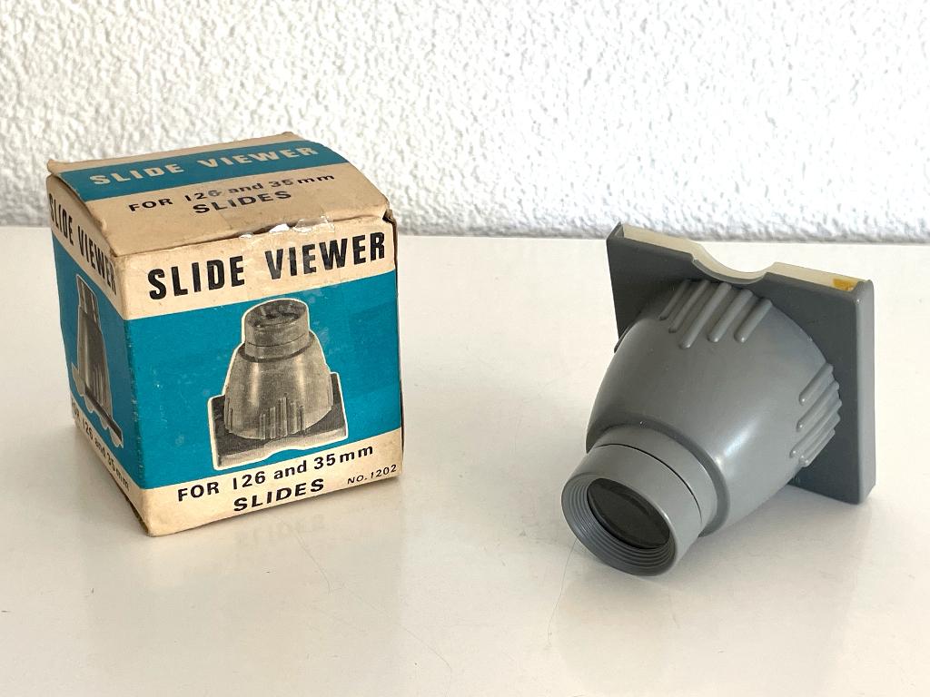 Een vintage slide viewer, 126 en 35 mm, met doosje, Gebruikt, Made in Hongkong, Onbekend, Ophalen of Verzenden