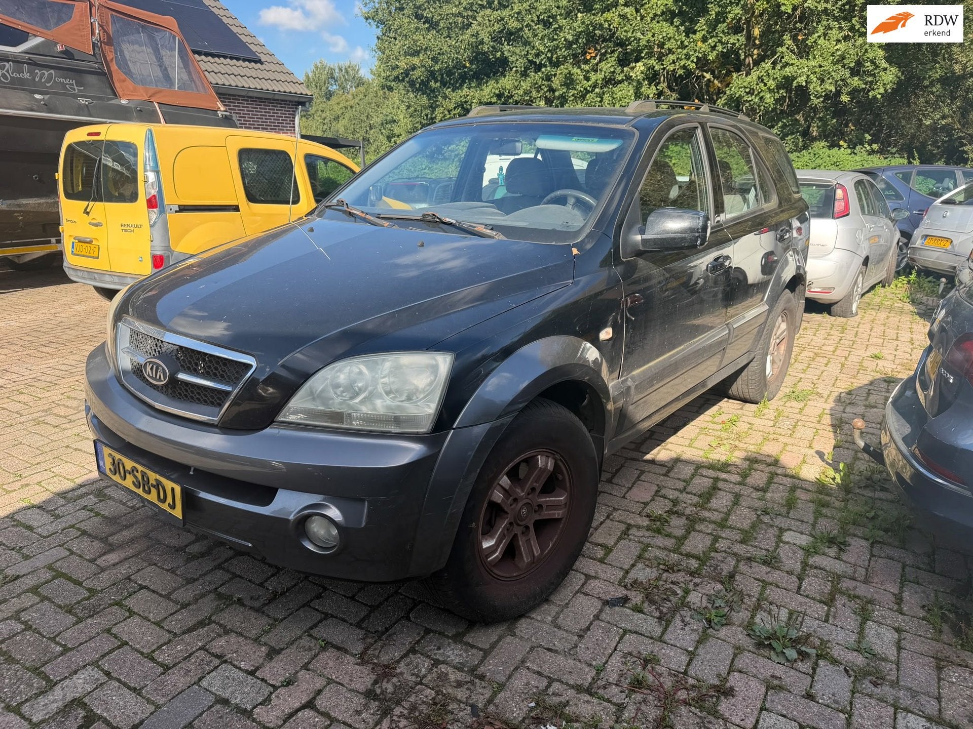 Kia Sorento 2.4i Comfort EXPORT, Gebruikt, 4 cilinders, Zwart, Origineel Nederlands
