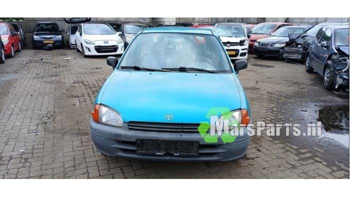 Schokdemperpoot links-achter van een Toyota Starlet, Gebruikt, -, -, Ophalen of Verzenden