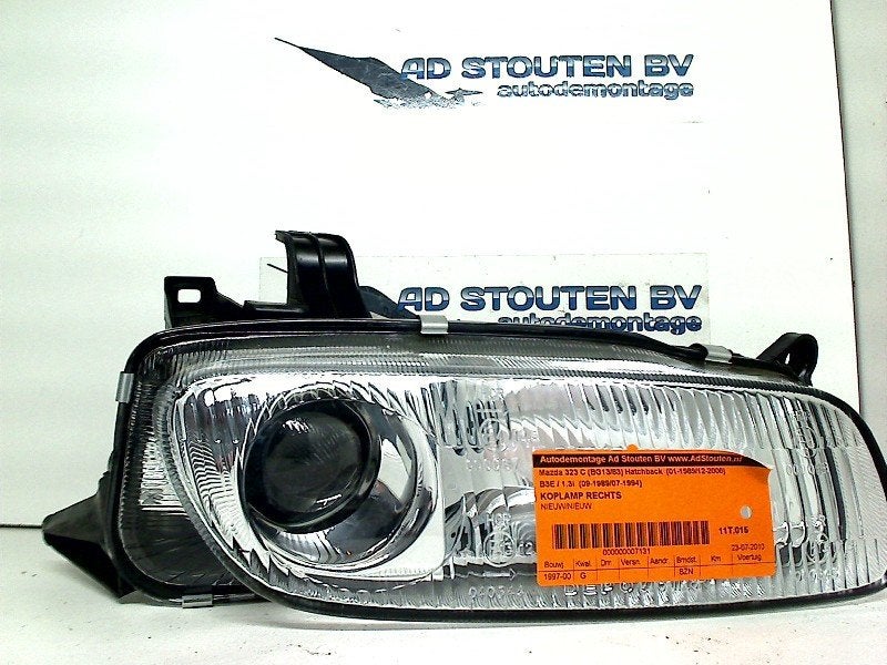 Koplamp Rechts Mazda 323 C (BG13/83) (1989-09/1994-07), Gebruikt, Hitdorfer Straße 73, Leverkusen 51371, , Duitsland, Mazda, Info@mazda.de