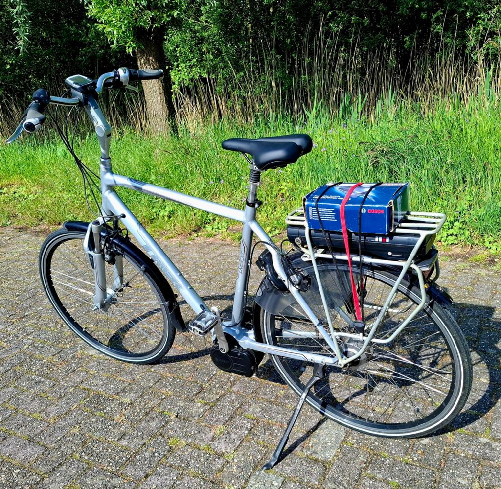Zeer nette elektrische Trek herenfiets, Bosch middenmotor ✅️, Versnellingen, Zo goed als nieuw, 57 tot 61 cm, Ophalen