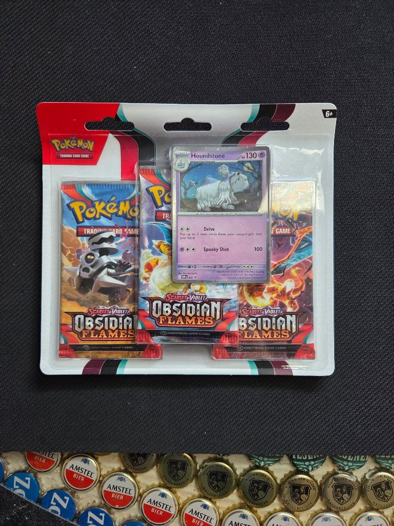 Houndstone Blister pack Obsidian Flames, Ophalen of Verzenden, Nieuw, Booster, Foil