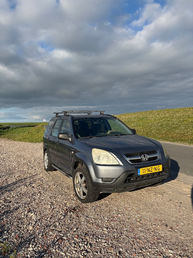 Honda CR-V 2.0 I 2004 - Inc. dakdragers & 2 reservewielen, Auto's, 1998 cc, Stof, 1429 kg, Zwart