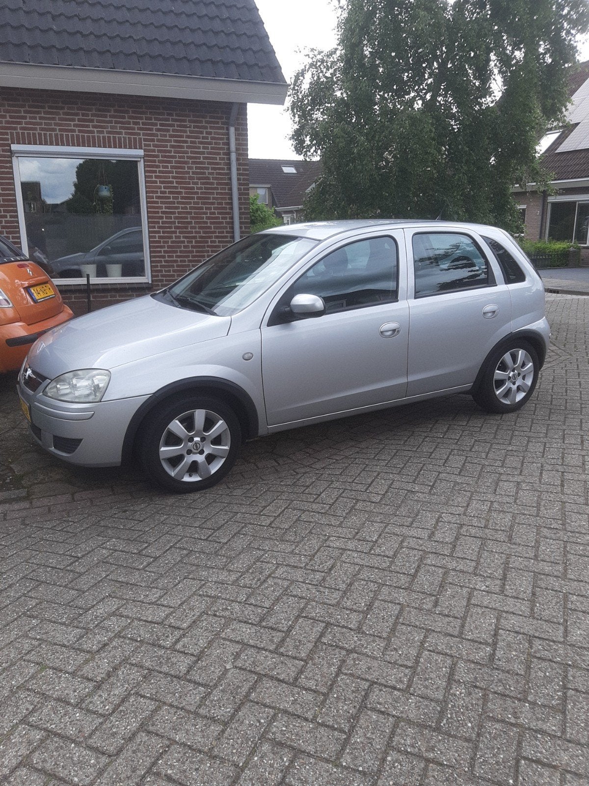 Opel Corsa 1.4 5D 2005 Grijs uniek 75700 KM., Auto's, Opel, Voorwielaandrijving, 450 kg, 40 €/maand, 4 cilinders