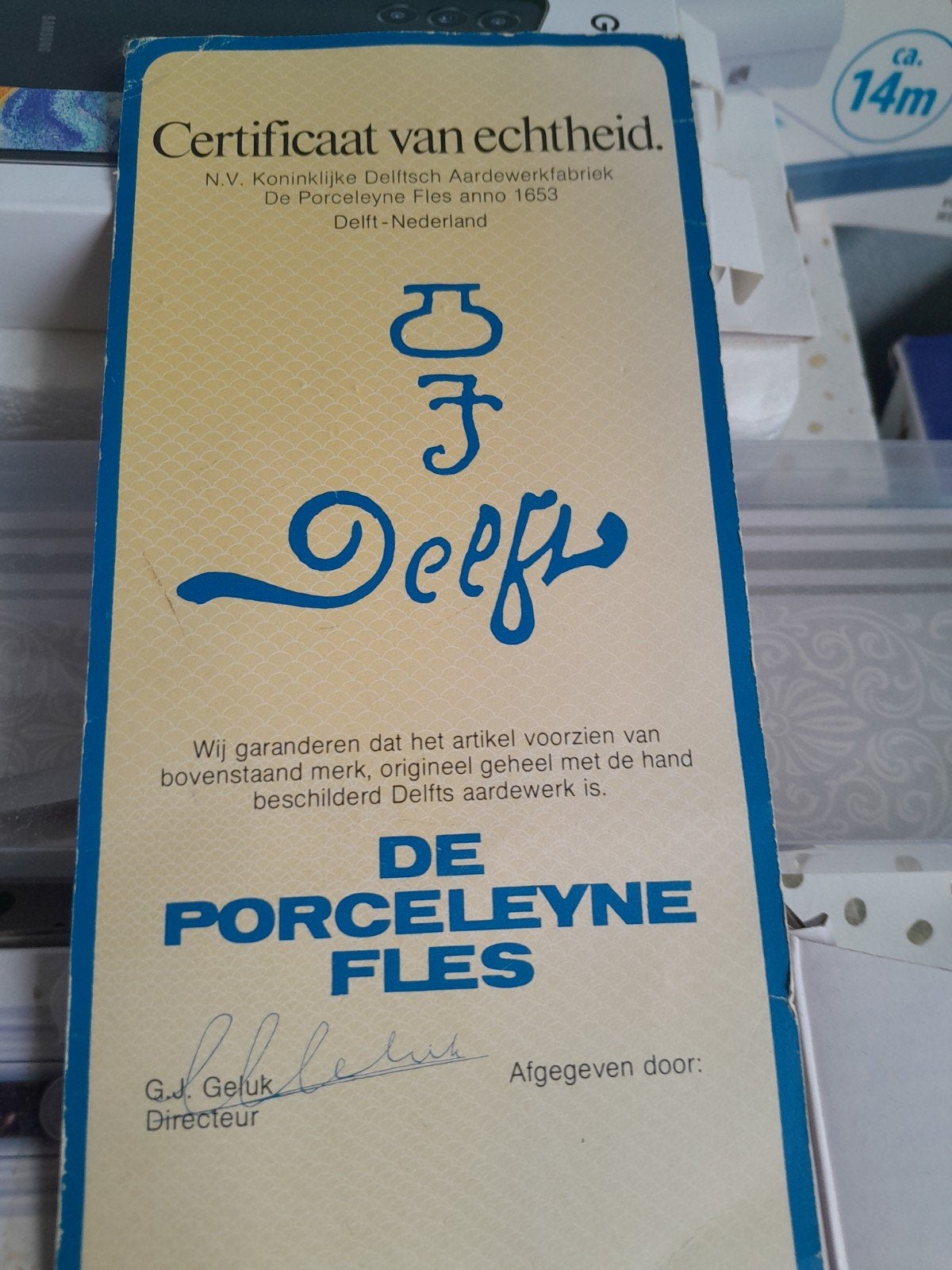 Dels blauw borde met certificaat erby, Ophalen of Verzenden