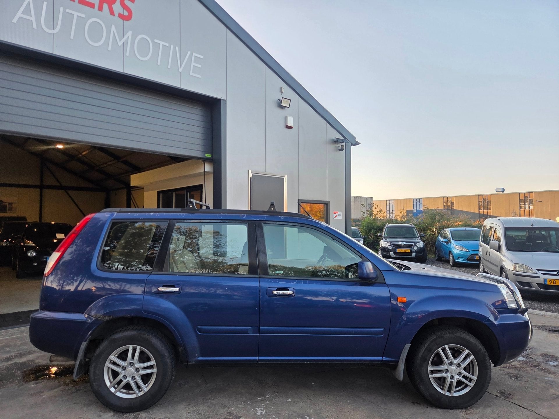Nissan X-Trail 2.5 Elegance 4X4, Auto's, 4 cilinders, 2000 kg, Blauw, Bedrijf