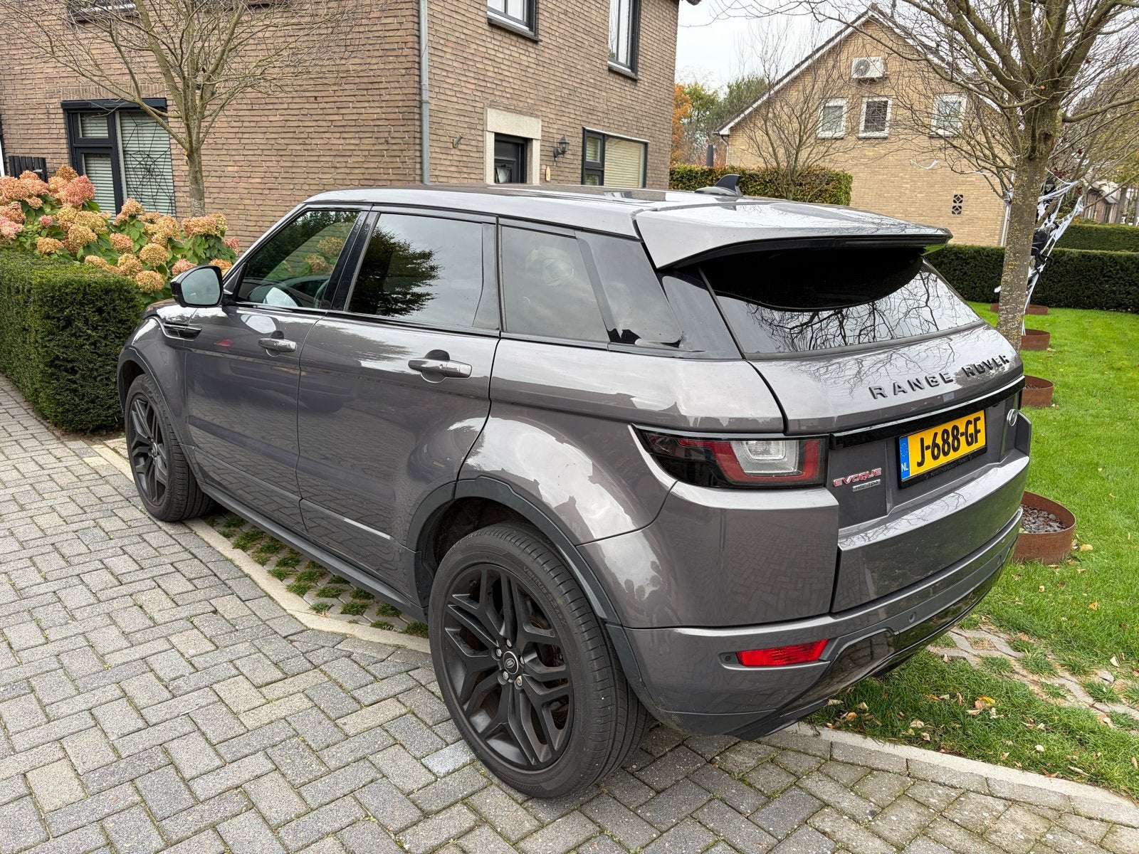 Land Rover Range Rover Evoque 2.0 TD4 4WD AUT 2015 Grijs, Auto's, Automaat, Dealer onderhouden, 2000 kg, 179 pk