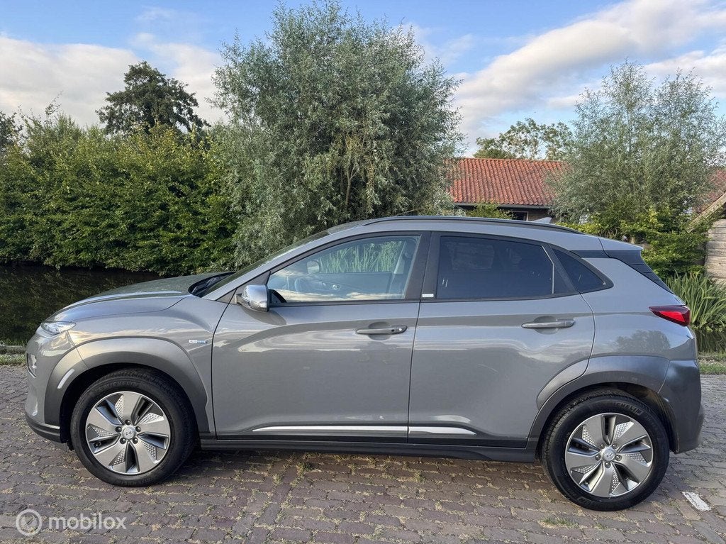 Hyundai Kona EV Comfort Smart 39 kWh | Stoelv. | Camera, Auto's, Hyundai, Gebruikt, Met garantie (alle), 39 kWh, 305 km