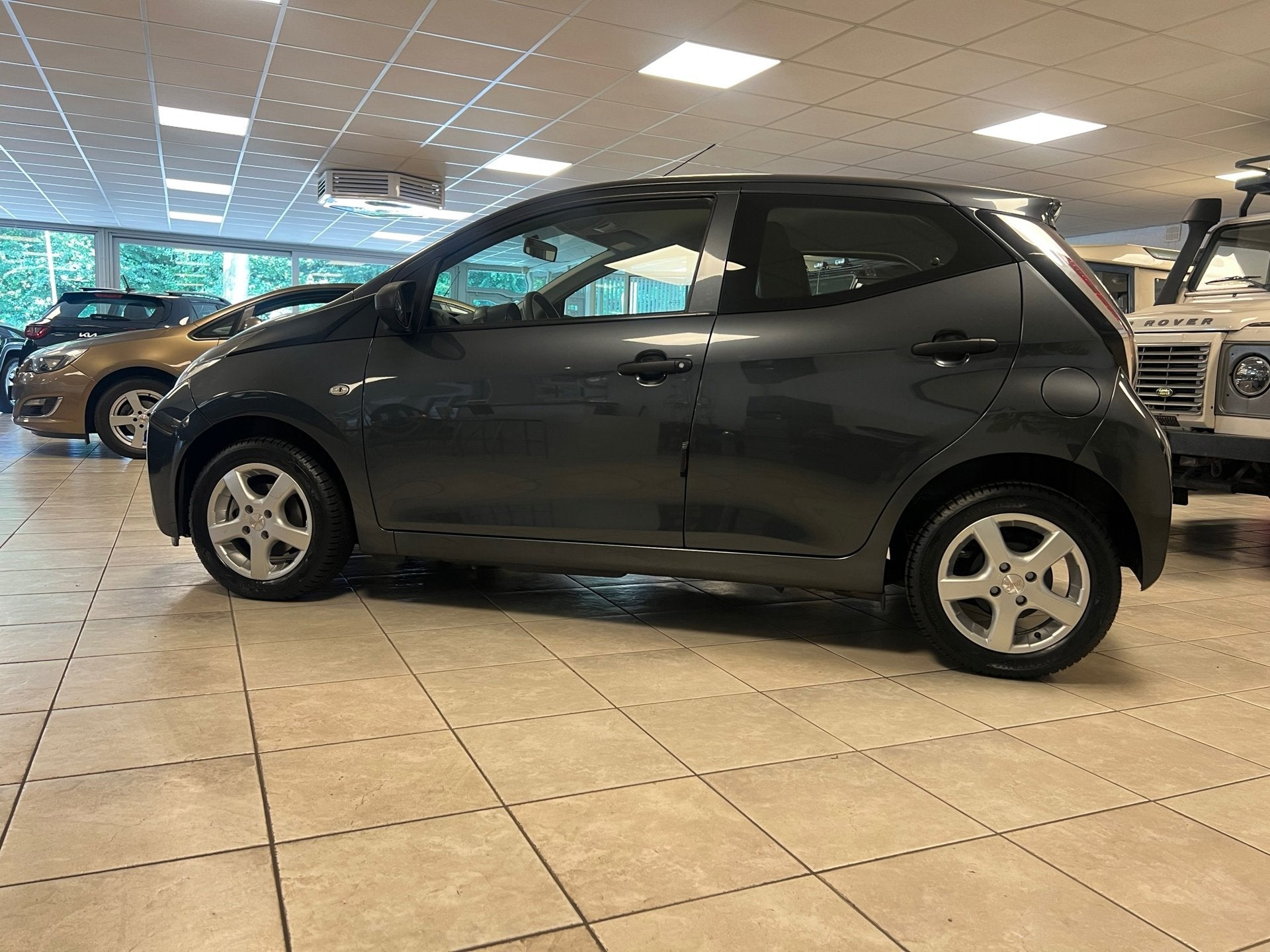 Toyota Aygo 1.0 VVT-i x-fun Airco, Cruise control., Voorwielaandrijving, Stof, Gebruikt, 4 stoelen