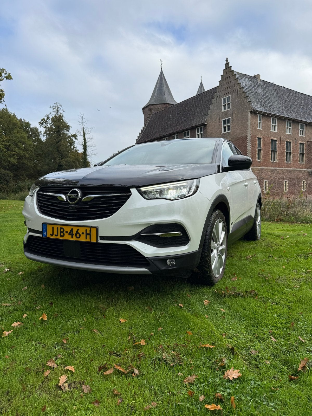 Opel Grandland X 1.6 Turbo Hybrid4 300pk 4x4 Aut 2020 Wit, Auto's, Automaat, 1250 kg, Wit, Bedrijf