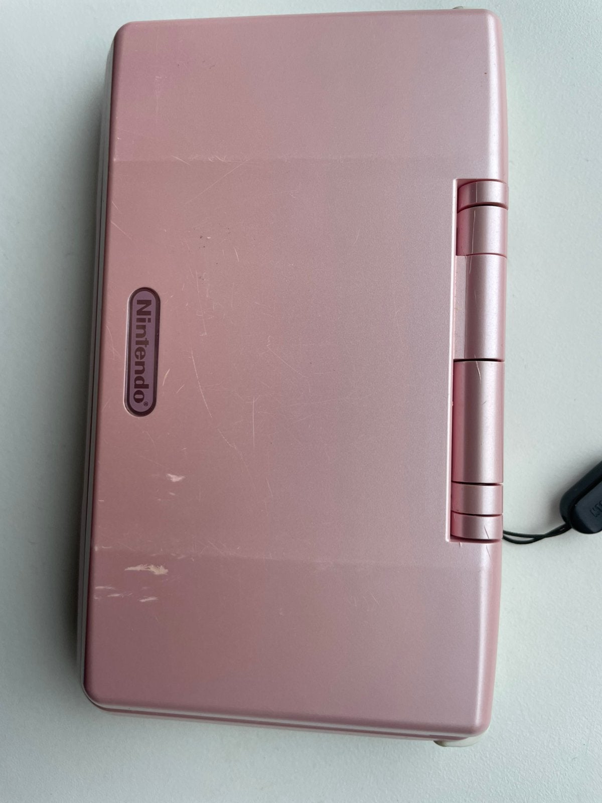 Nintendo ds phat - roze, Spelcomputers en Games, Spelcomputers | Nintendo DS, Ophalen of Verzenden, Zo goed als nieuw, Zilver