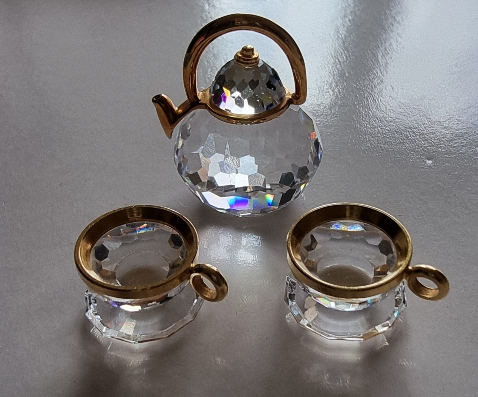Swarovski Crystal Memories Theeservies Goud, Verzamelen, Ophalen of Verzenden, Zo goed als nieuw, Figuurtje