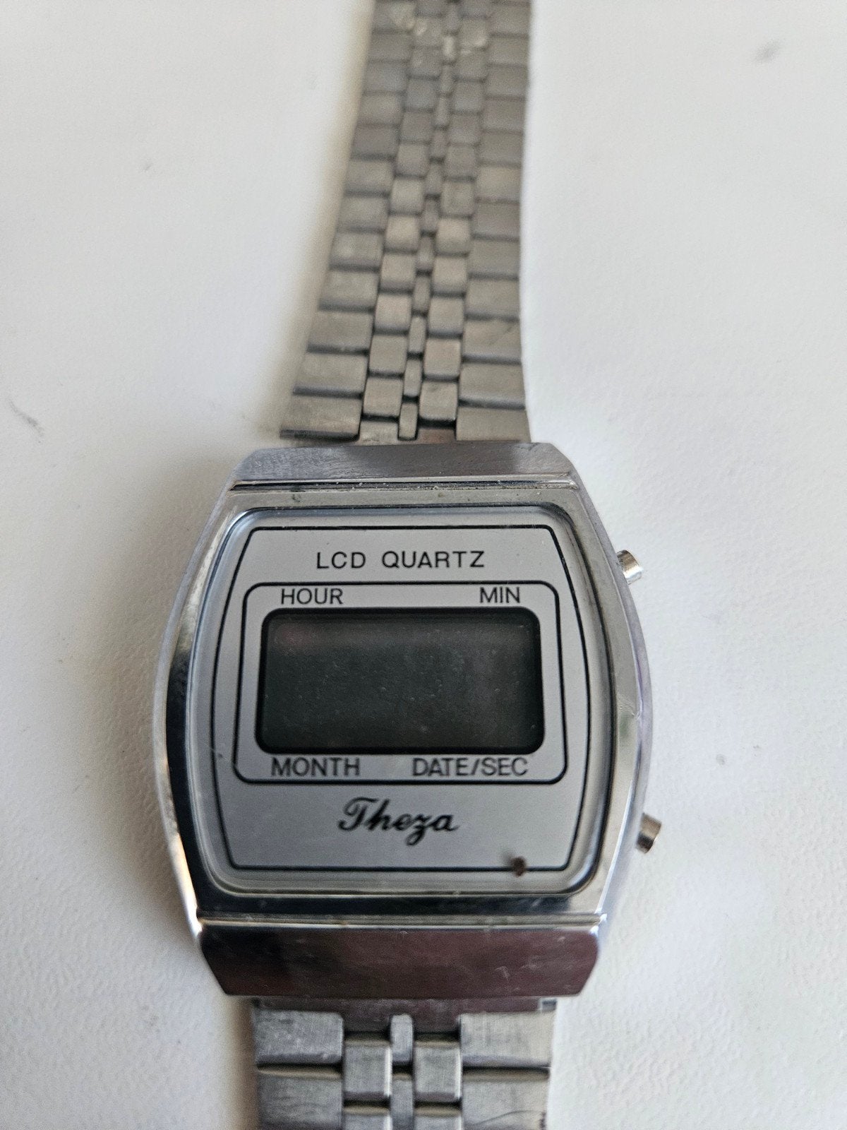 Vintage Theza LCD Quartz horloge jaren '70, Overige merken, Staal, Met bandje, Polshorloge