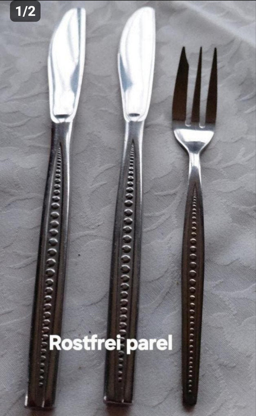 Bestek Rostfrei Germany parelmotief in de handvatten, Antiek en Kunst, Antiek | Bestek, Ophalen of Verzenden