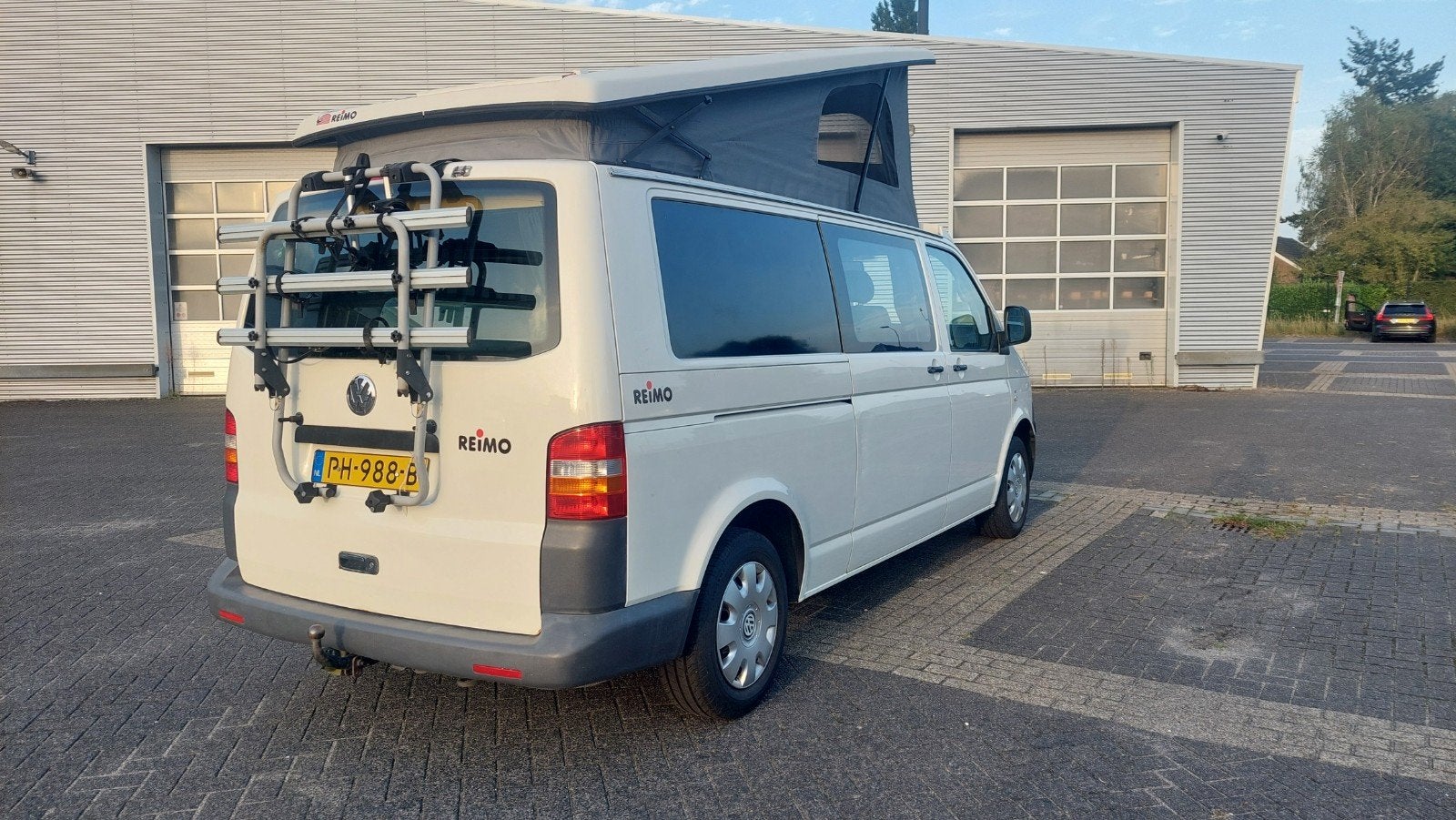 Foto 4 van VW T5 REIMO # 6 ZIT+4 SLAAPPLAATSEN # SLAAPHEFDAK #LENGTEZIT